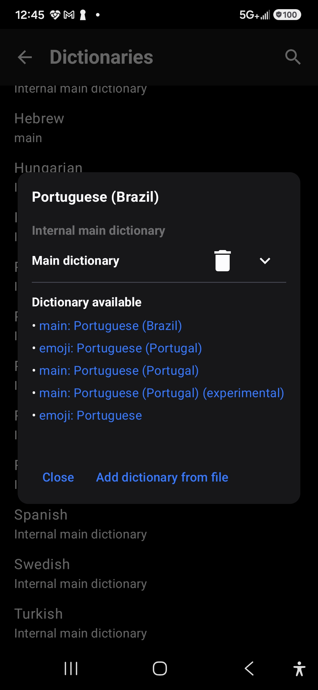 Portuguese (Brazil) dictionary panel with the main dictionary installed and a list of other available dictionaries including emoji